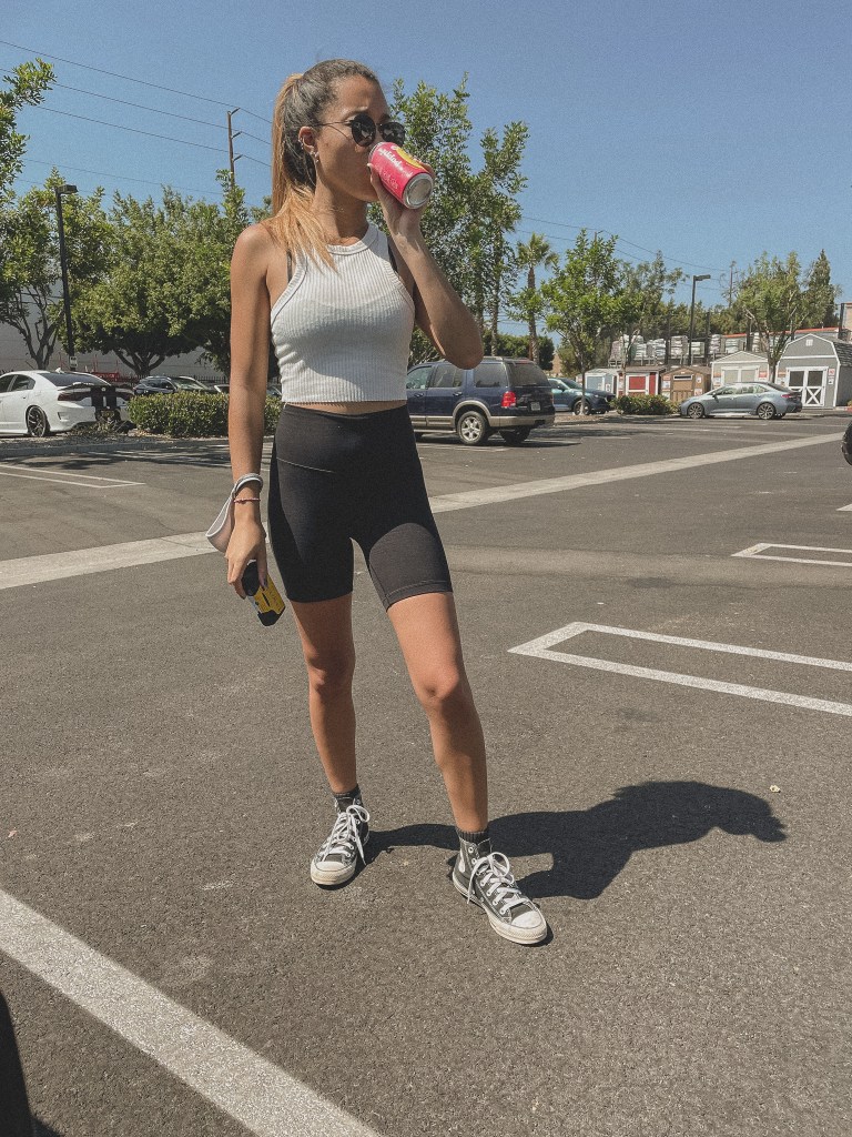 Poppi Probiotic Drink wearing Aritzia